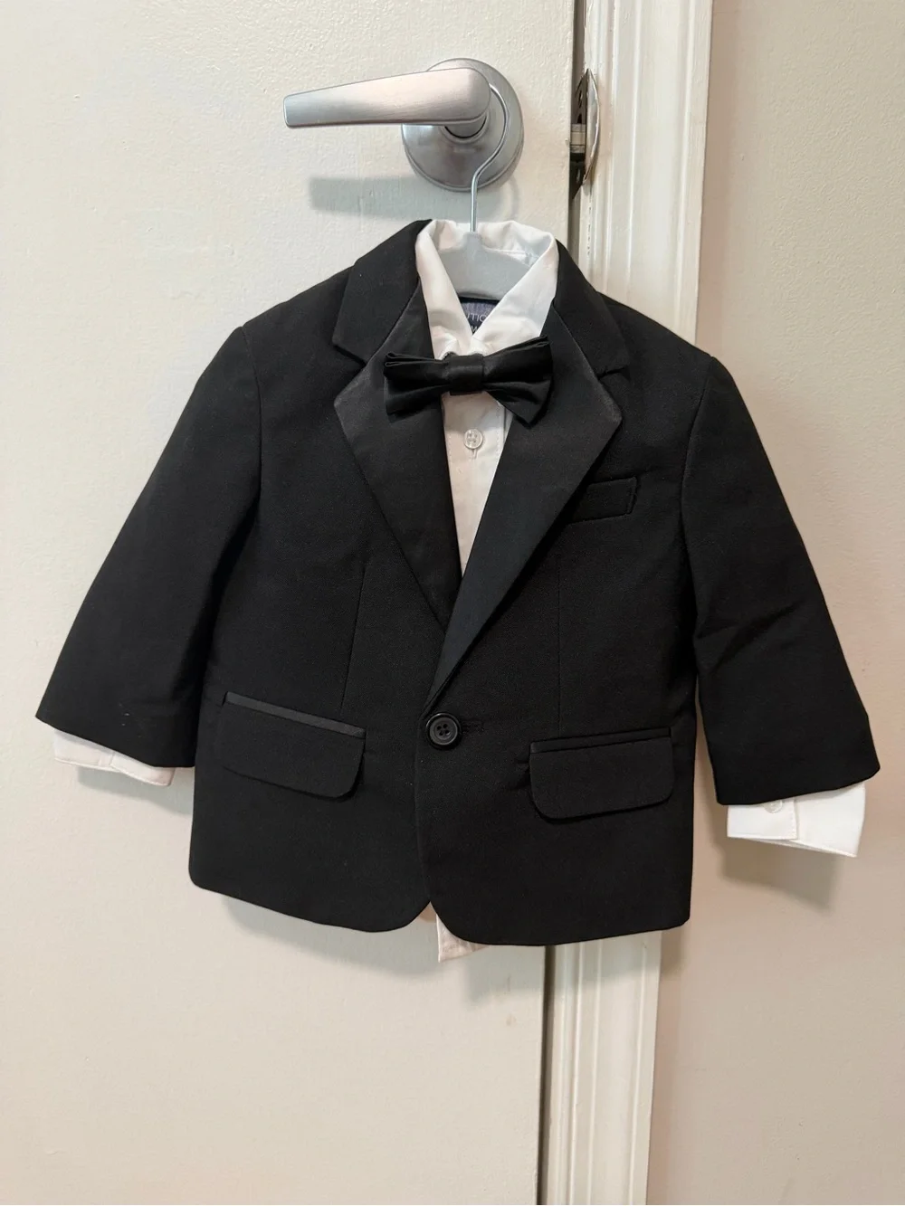 12M Black Tuxedo Jacket & pants, with White Shirt and Bow Tie. Only worn once!